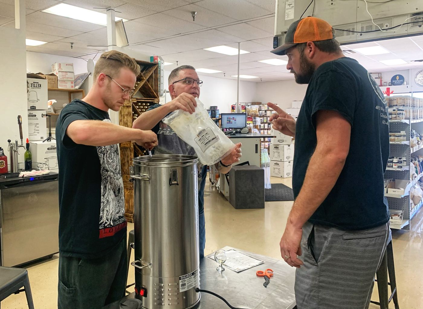 Adding ingredients to the kettle during Brewing 101