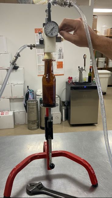 Counter-pressure bottle filler