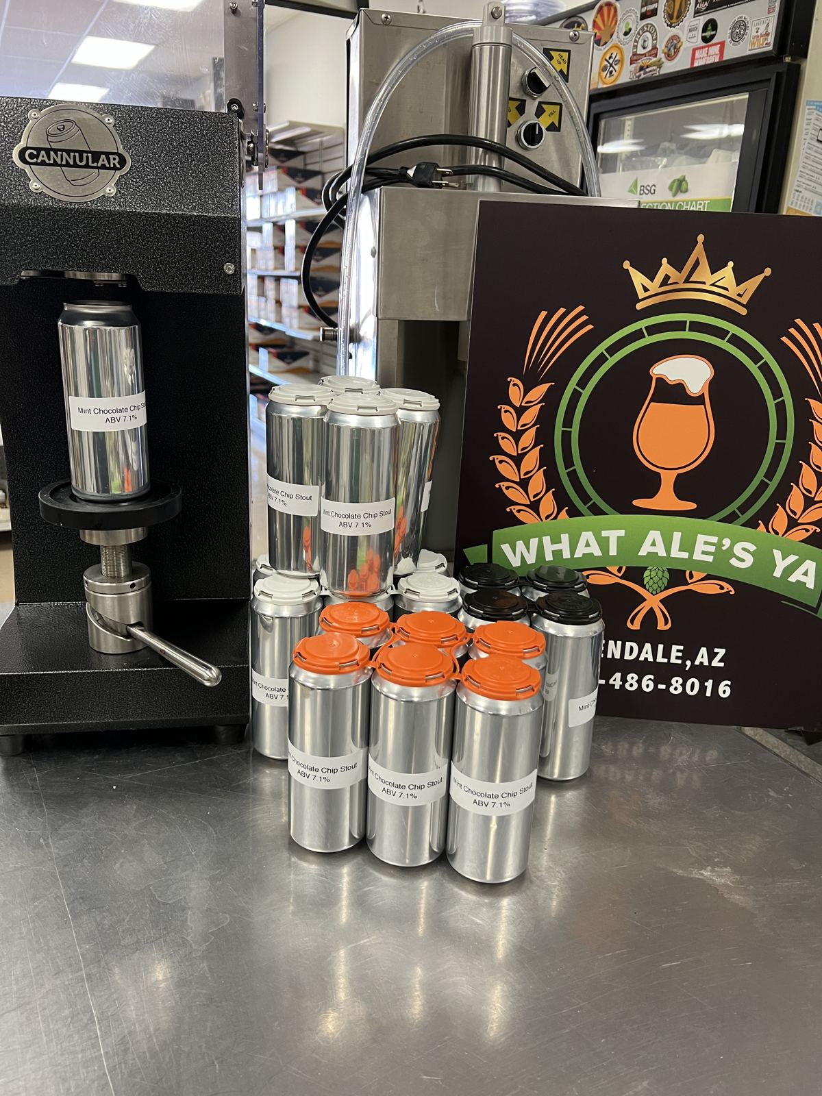Can seamer and freshly canned beer