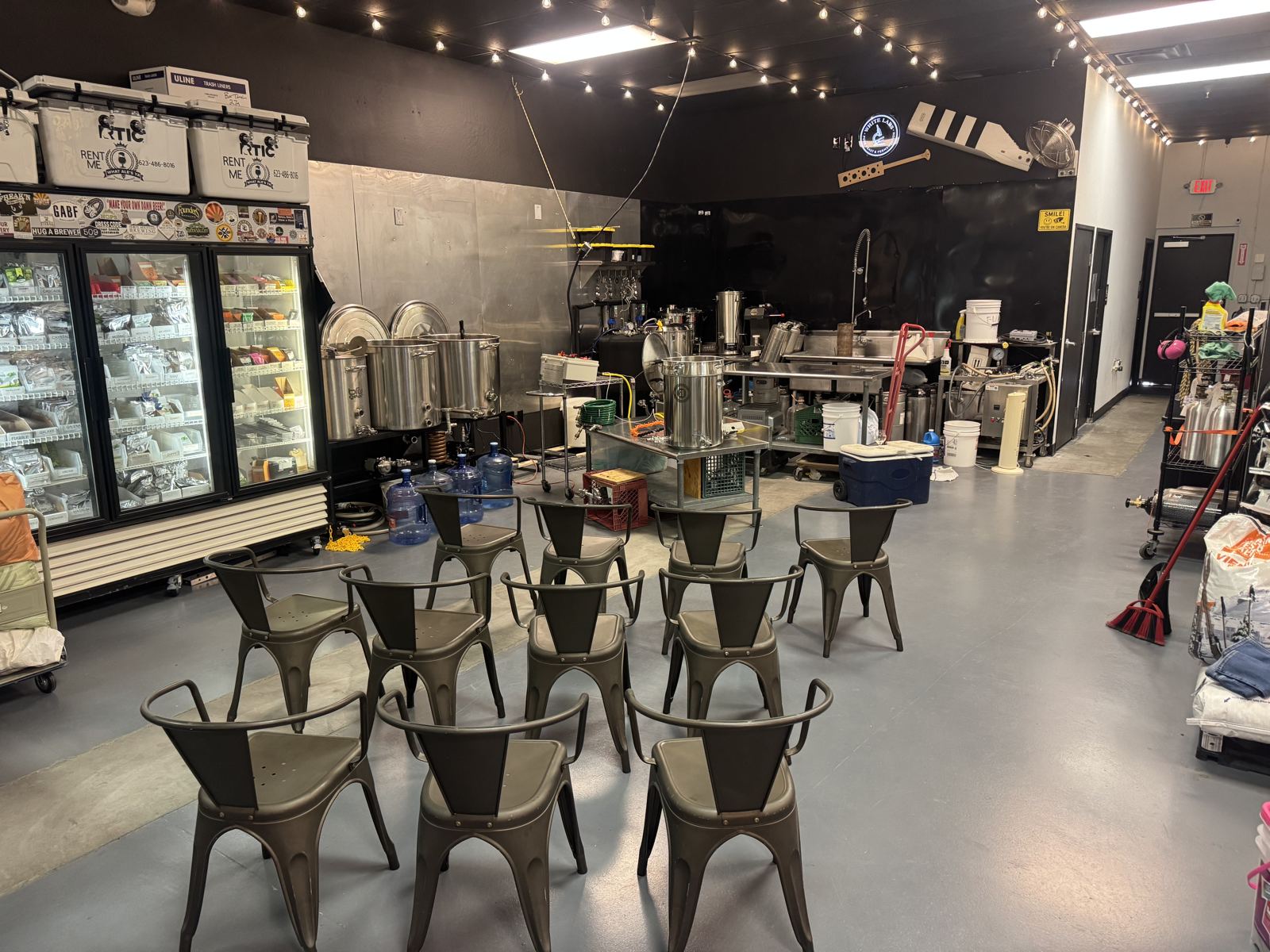 Inside Hopsology Taproom, with the brew shop in the back